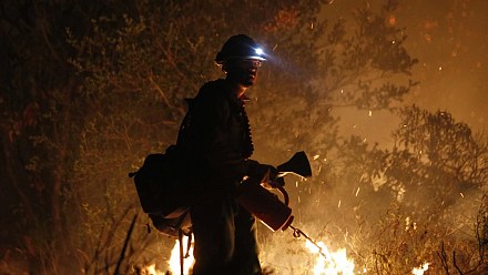 Forest fires force 13,600 people to leave homes and camps in Europe