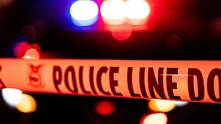 Woman kills man found hiding under daughter's bed in US