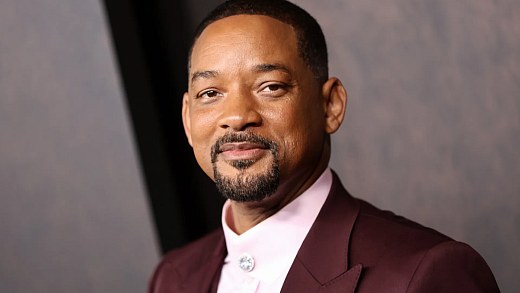 Will Smith is thrilled to win a new work by Eduardo Kobra at an event in São Paulo