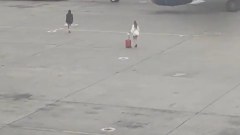 Two women invade Russian airport runway after missing flight