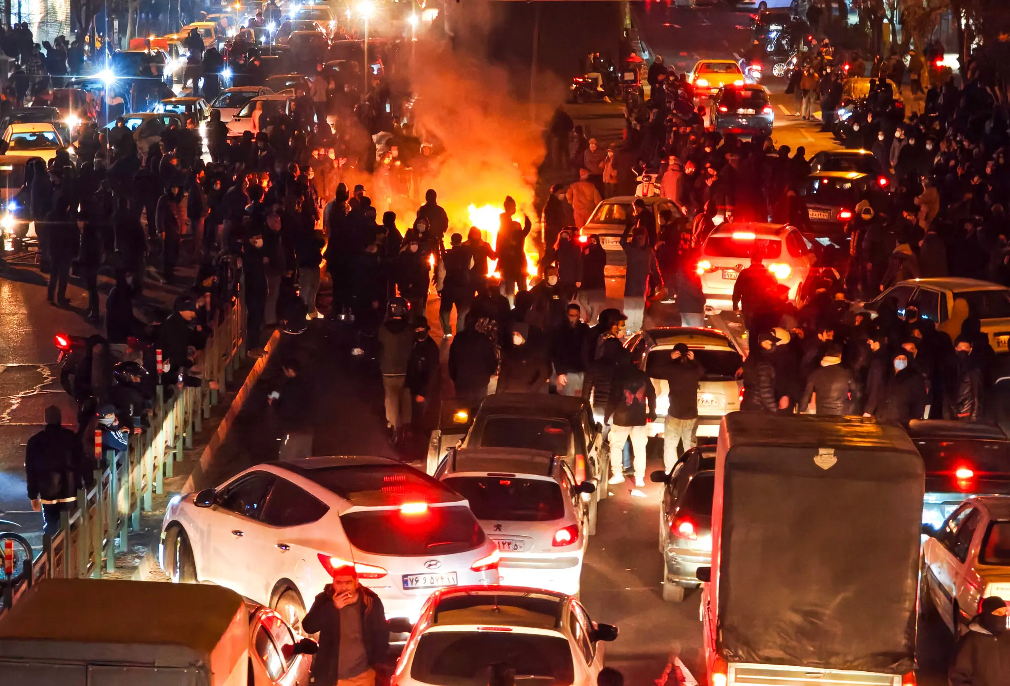 Iran publicly executes two protesters and expands repression after protests